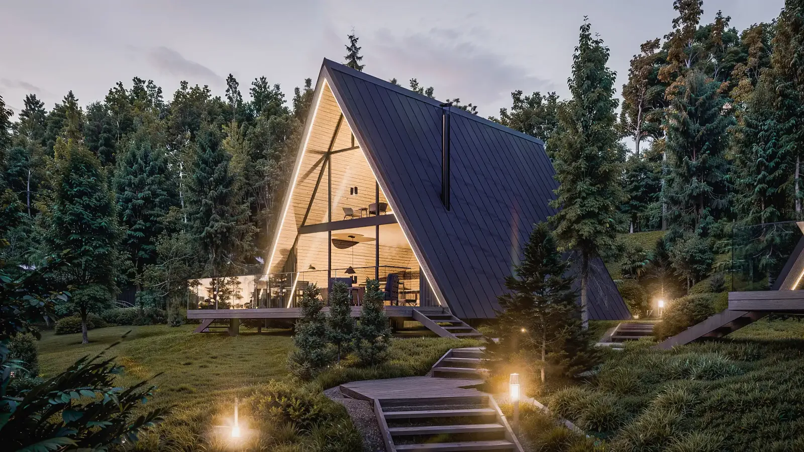 An A-frame house among pine trees at dusk