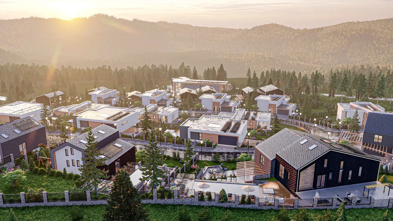 Housing development on a mountain slope at sunset