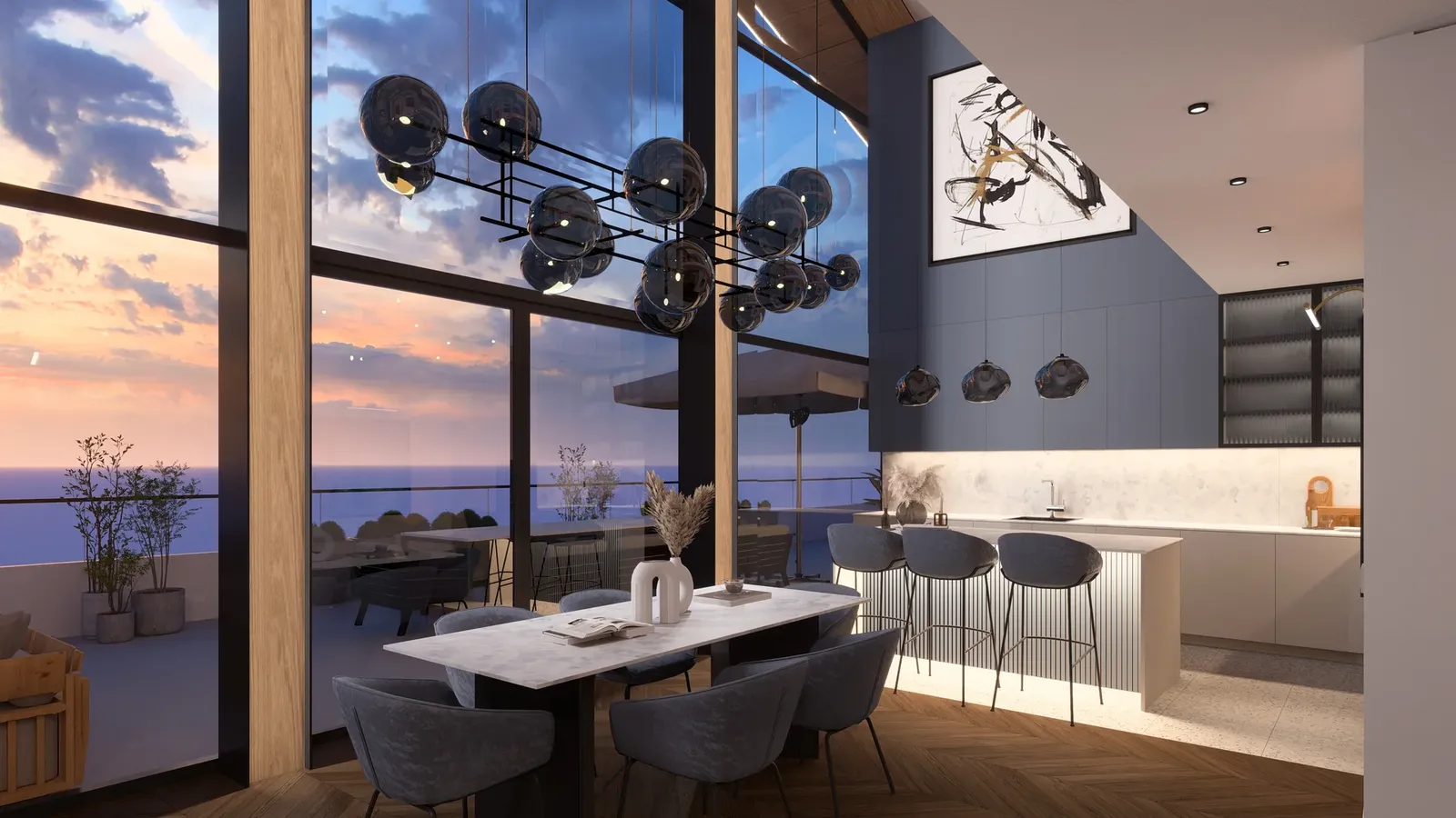 Dining area and kitchen with a breakfast bar and terrace view