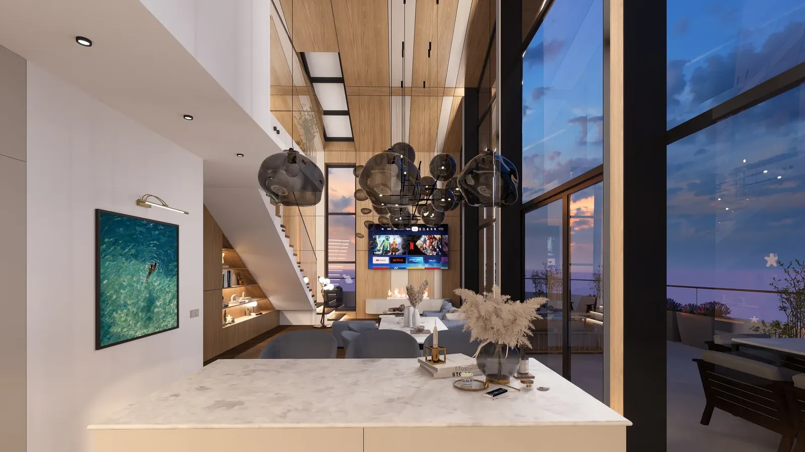 Stone kitchen island with a view up to the gallery
