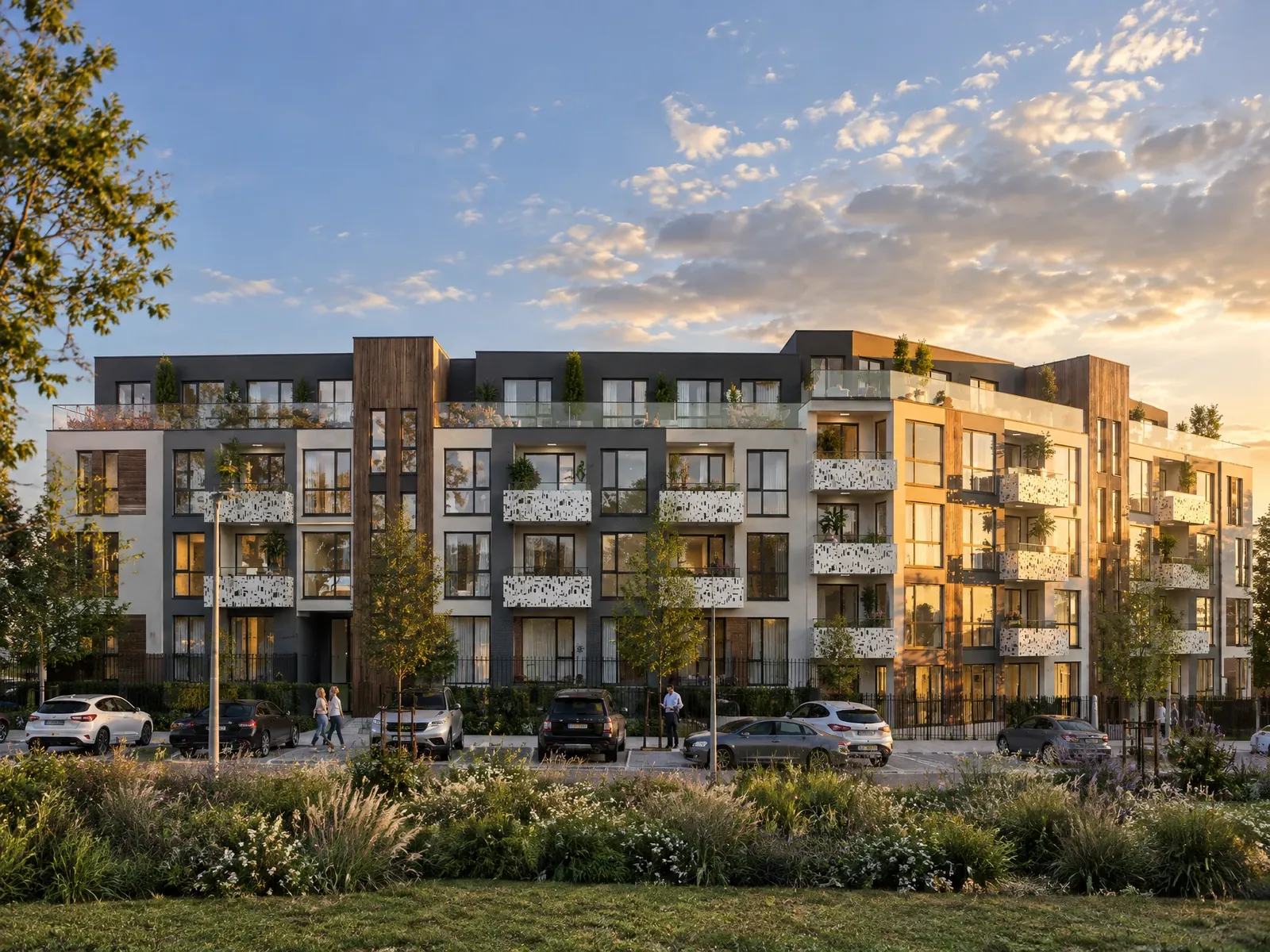 Main facade of the apartment building at sunset