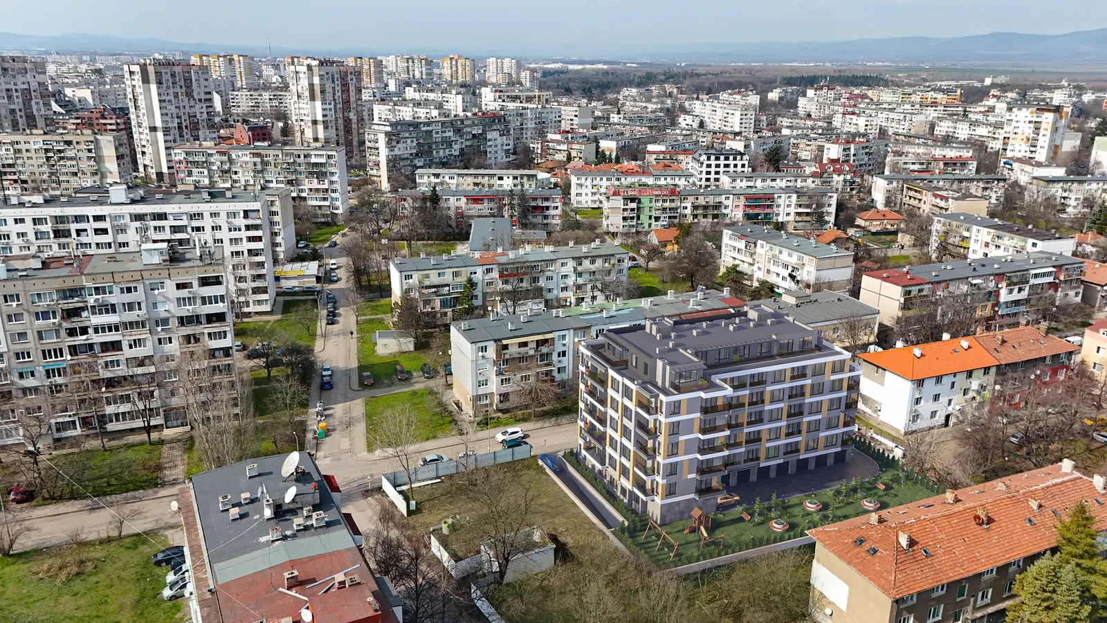 Aerial view of the building in its neighbourhood