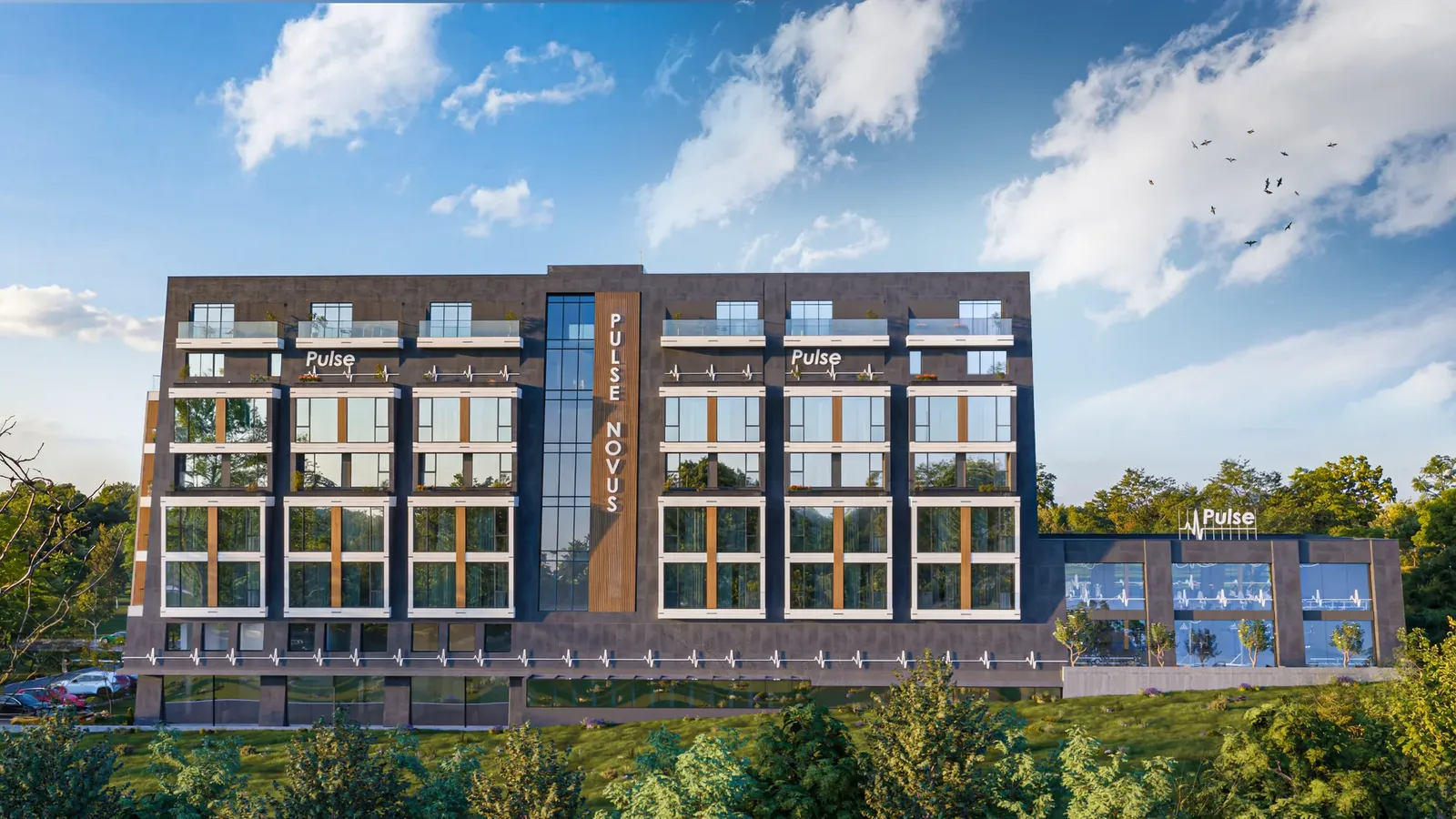 The long facade with its vertical accent
