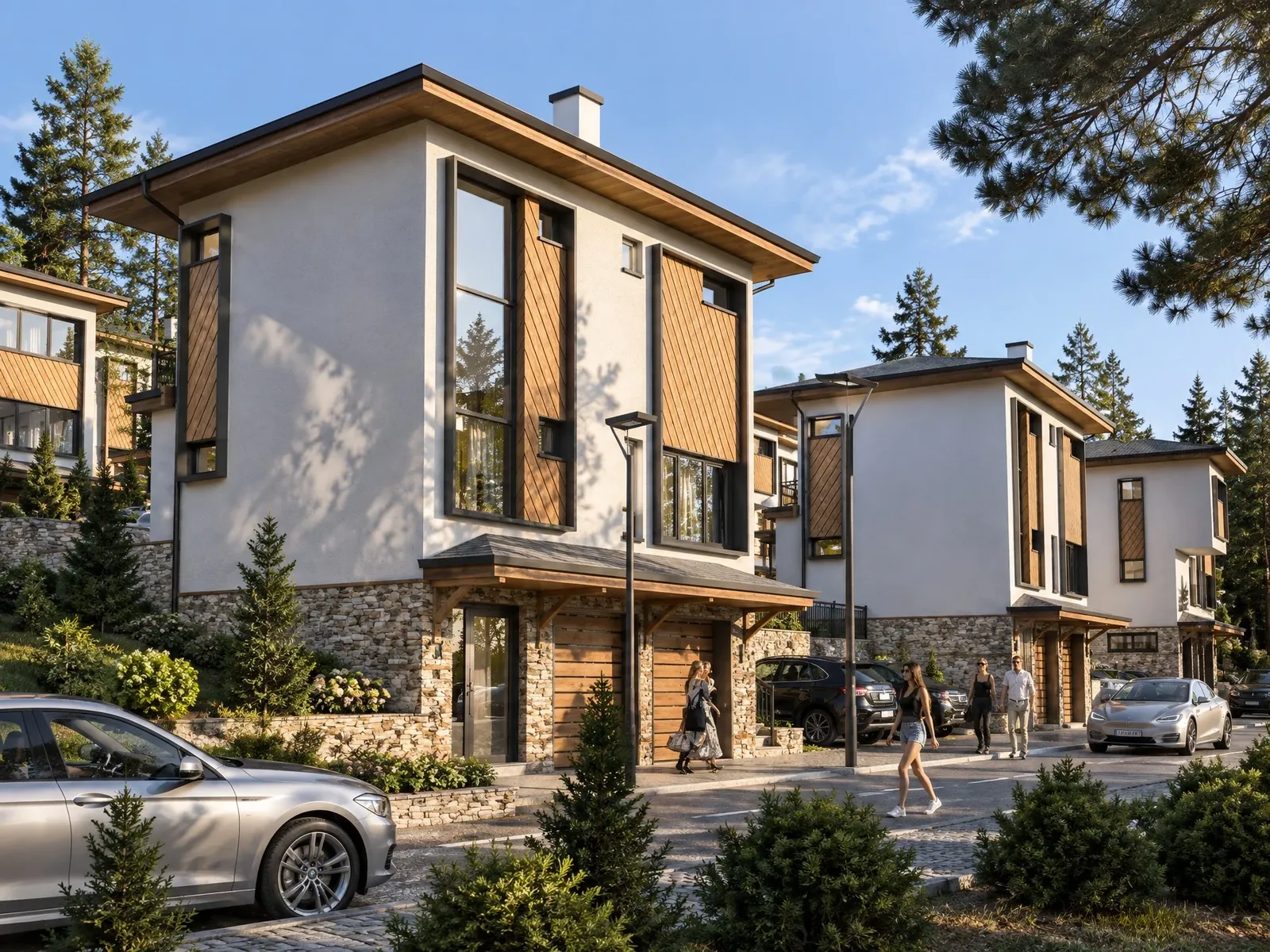 The house by day with garages in the stone plinth