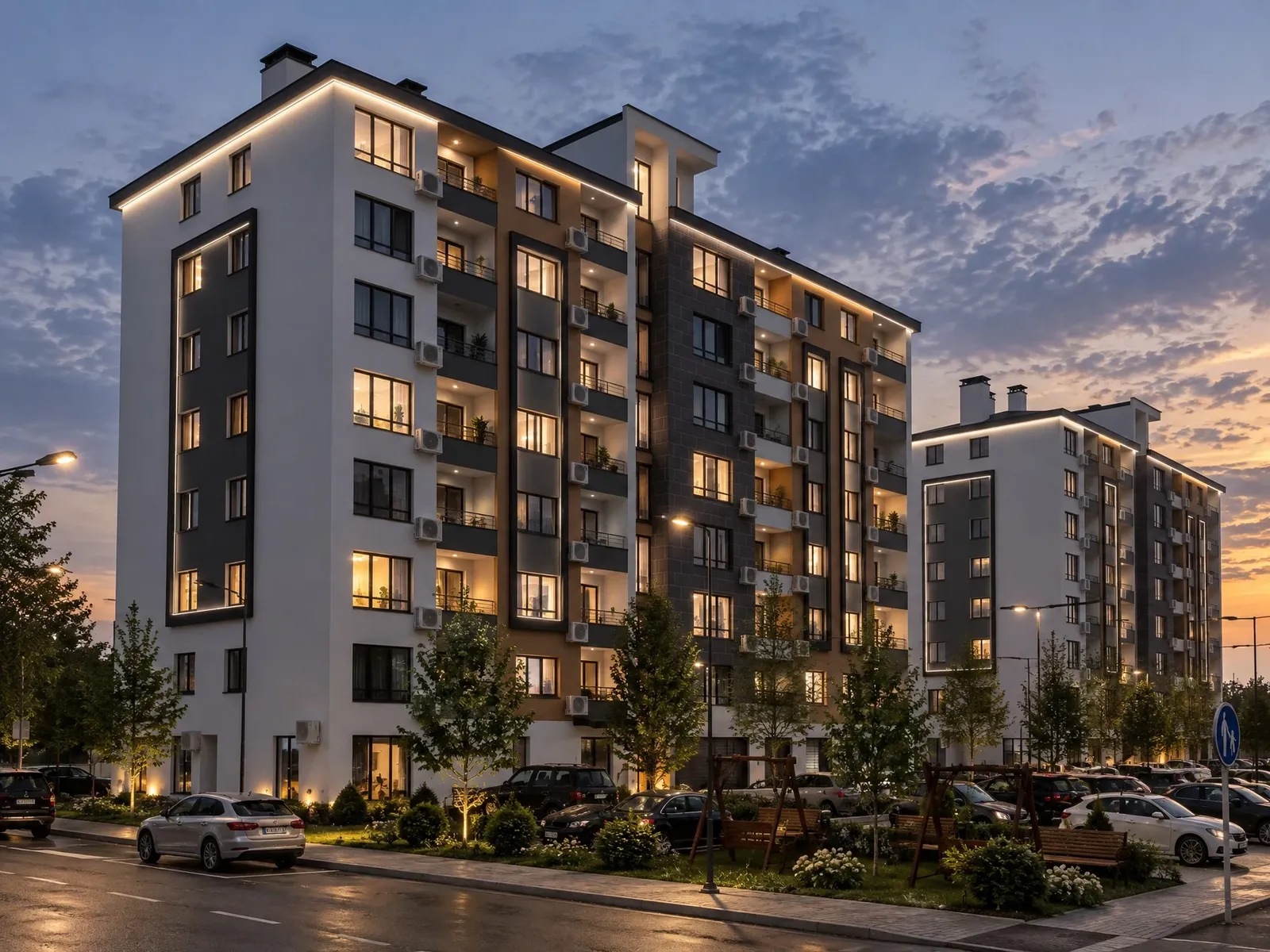 Facade with graphite and white accents at sunset