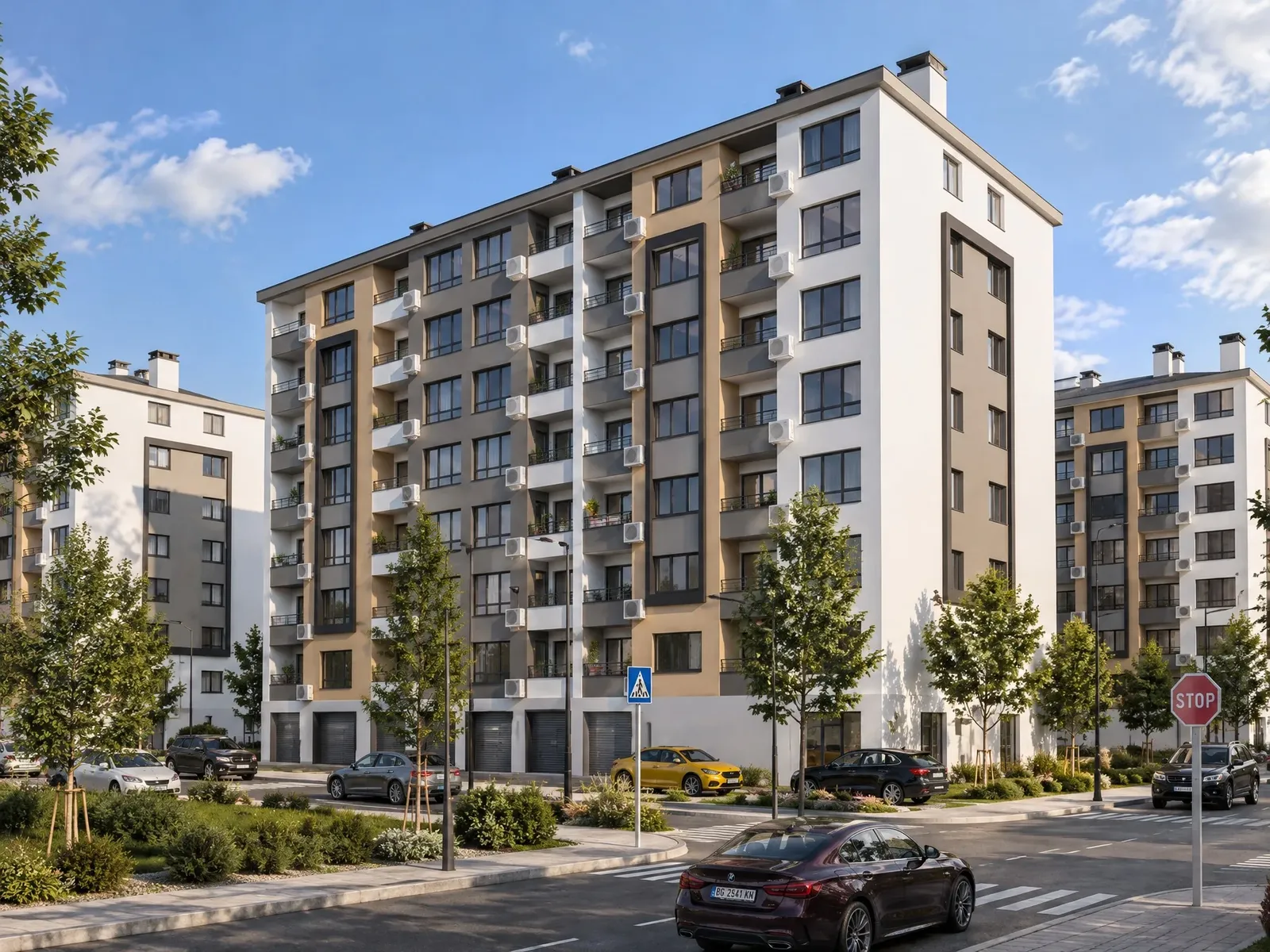 Building with beige and white accents by day